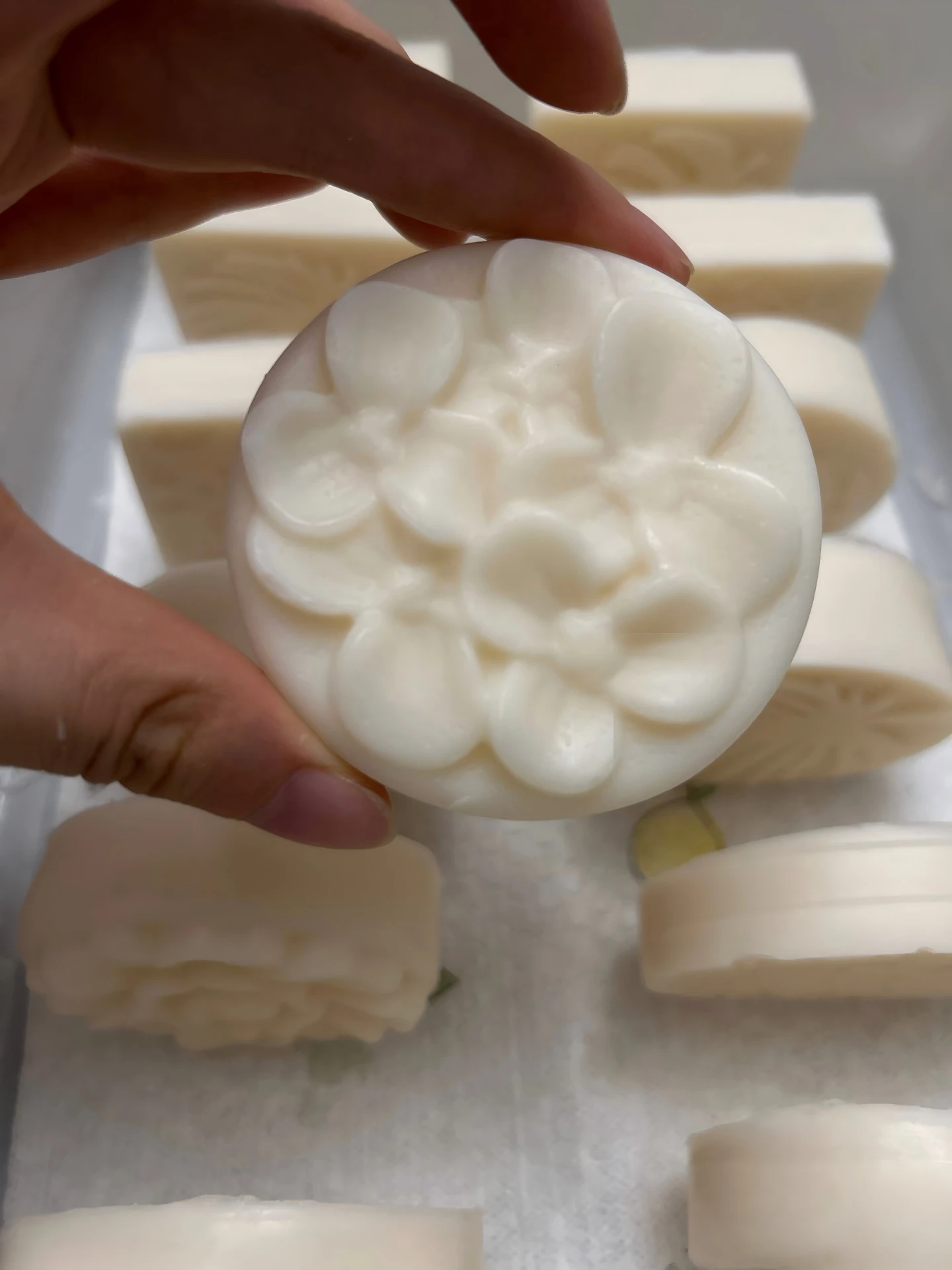 Soap batter reaching light trace in a mixing bowl during cold process soap making